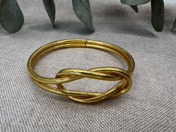 Pulsera infinity dorada