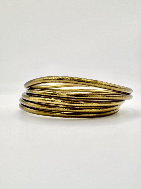 Pulsera fina dorado viejo