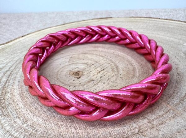 Pulsera trenzada fucsia