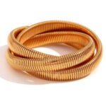 Pulsera serpentine triple dorada